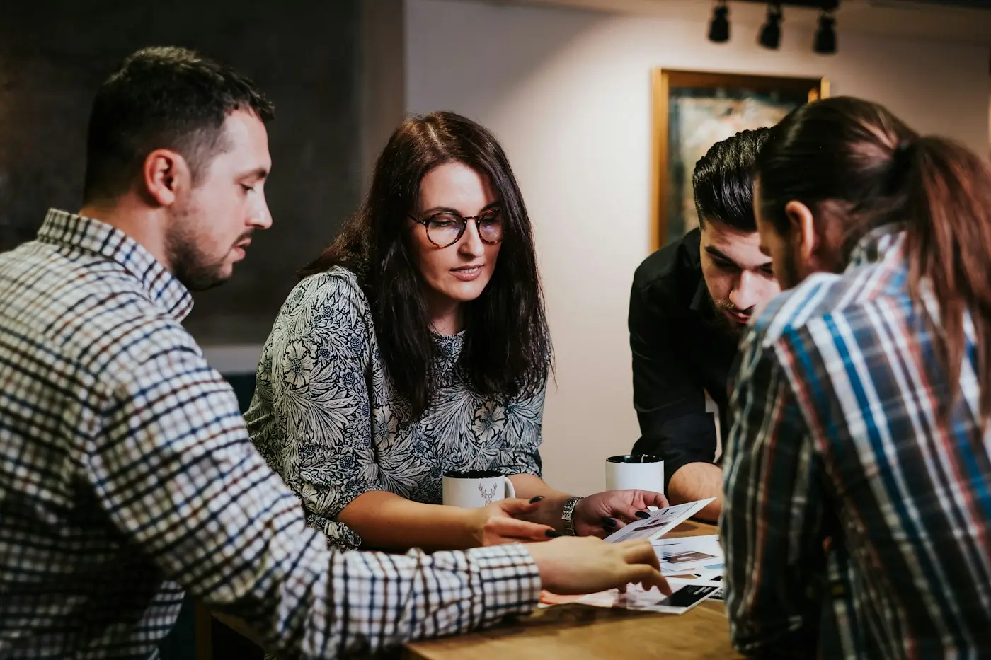 Professional services team meeting in an office (illustrative stock photo)
